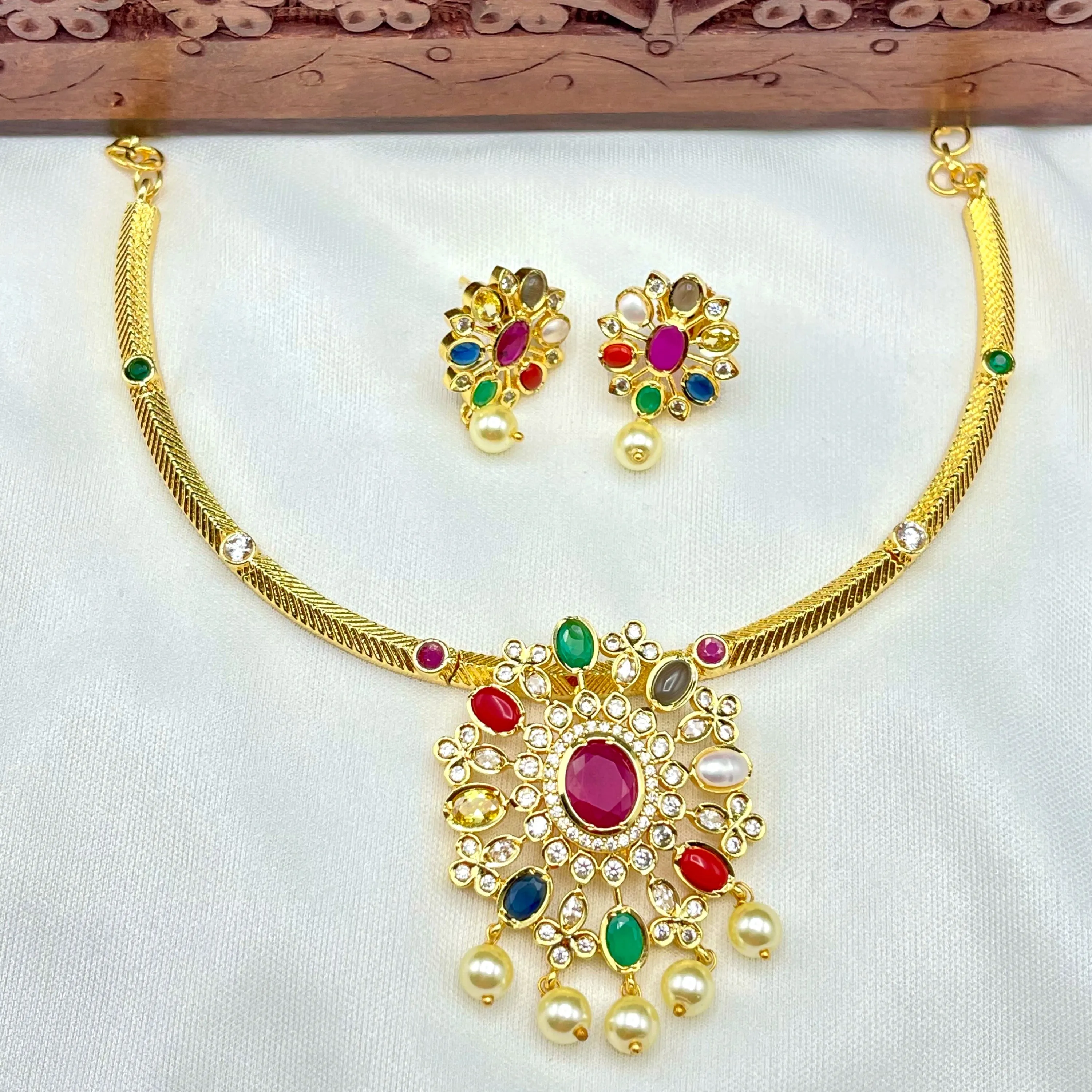 Navarathna Gold Finish Pendant and Earrings Necklace set